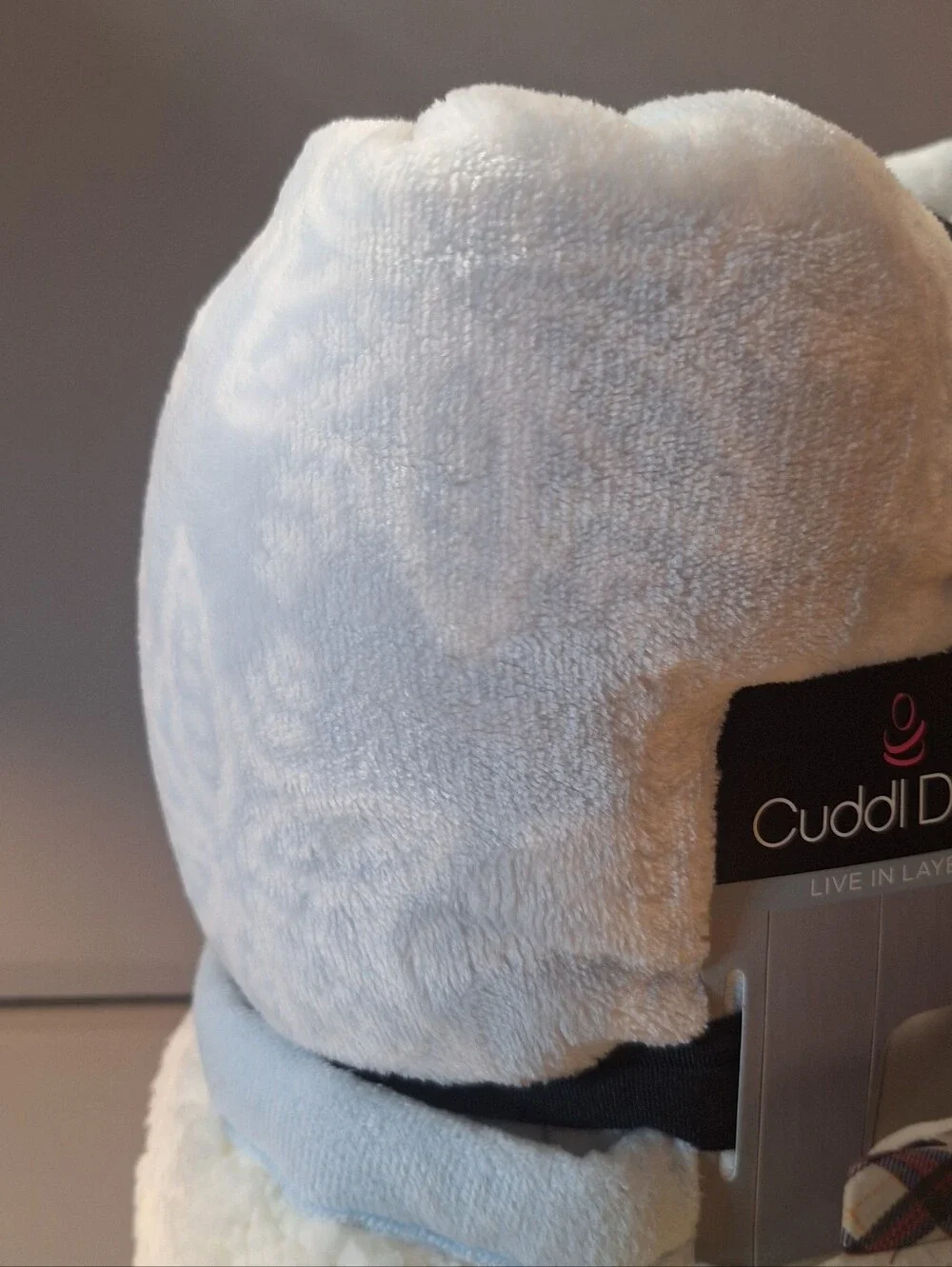 Cuddl Duds Blue Snowflake Throw is a cozy and stylish